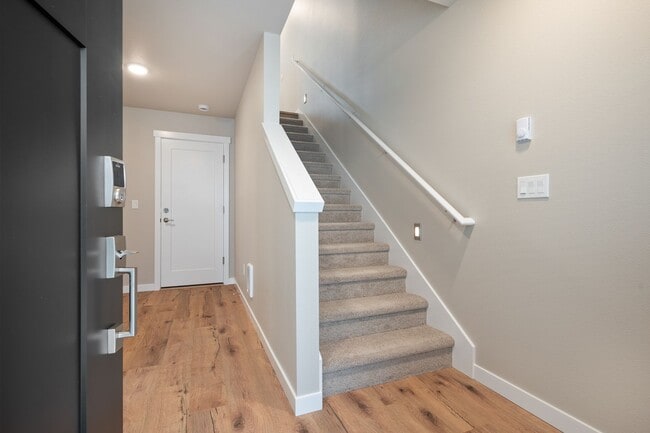 Building Photo - NEW CONSTRUCTION – Stylish 4-Bedroom Townh...