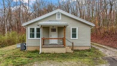 Building Photo - Harriman 37748 - Charming 2-bedroom, 1.5-bathroom Home nestled on 3.8 acres of woods - Contact Ch...