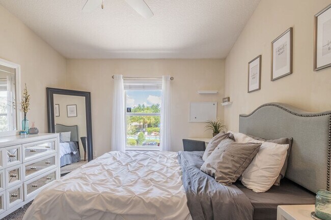 Building Photo - Heron's Landing End Unit Overlooking the Sparkling Community Pool