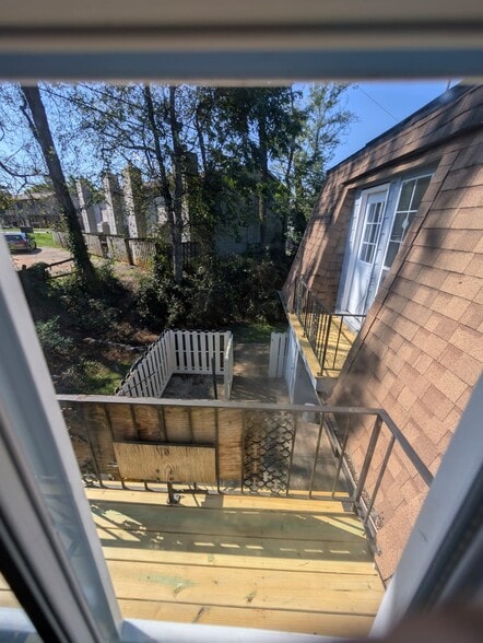 All three bedrooms have balcony views - 9102 Woodpark Ln