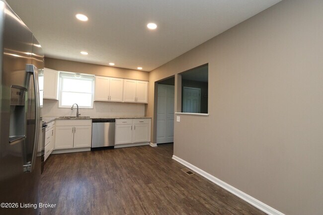 Building Photo - 6810 Village Green Blvd