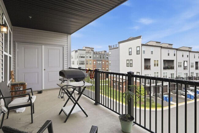 Building Photo - Perfectly positioned near the vibrant shopping and dining destination of One Loudoun, this reside...