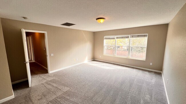 Building Photo - Spacious 4-Bedroom Home in HOA Community with Fantastic Amenities!