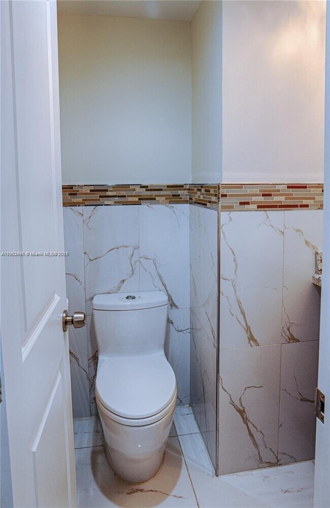 Building Photo - 10185 Collins Ave