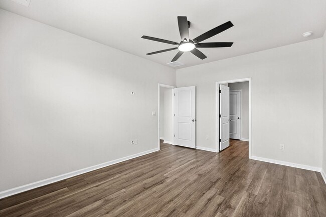 Building Photo - Modern 4BR Home with Screened Porch & Pond Views | Sun Colony, Longs SC