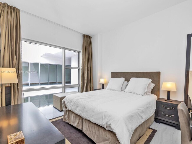 Building Photo - 6799 Collins Ave