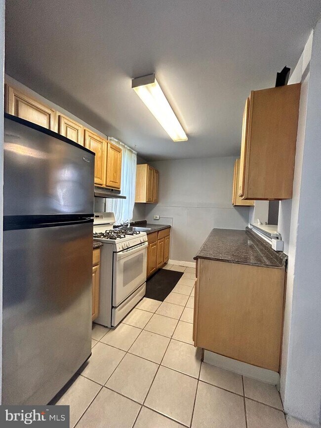 Building Photo - 3819 Woodlea Ave