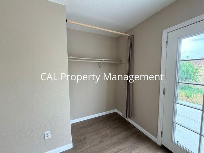 Building Photo - Spacious 4-Bedroom Home with 2-Car Garage & Backyard Oasis