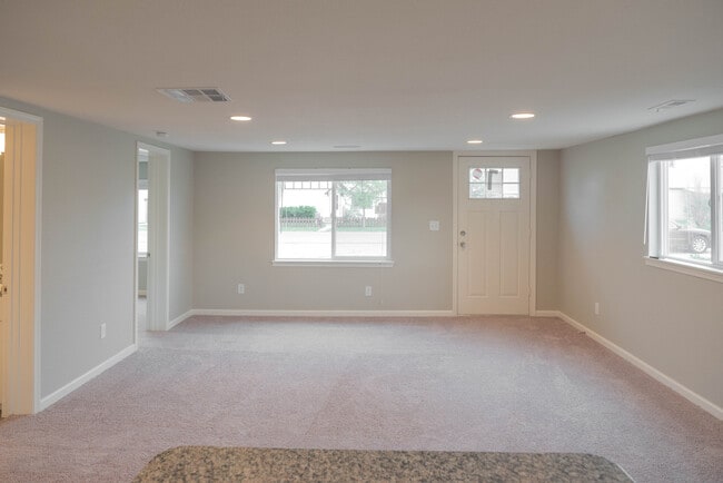 Building Photo - Remodeled home! Granite! SS Appliances!