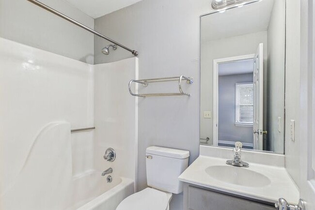 Building Photo - UNCG Area – Chancellors Court Townhomes. Walk to Campus and just minutes to Downtown!