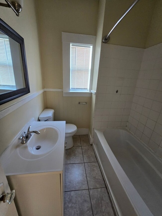 Building Photo - Nice 2 Bedroom & Large extra room that you...