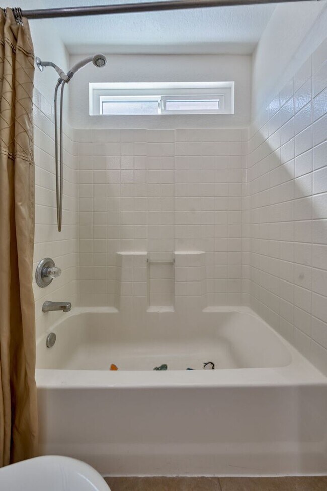 Building Photo - Spacious 4-Bedroom Home, Beautifully Maint...