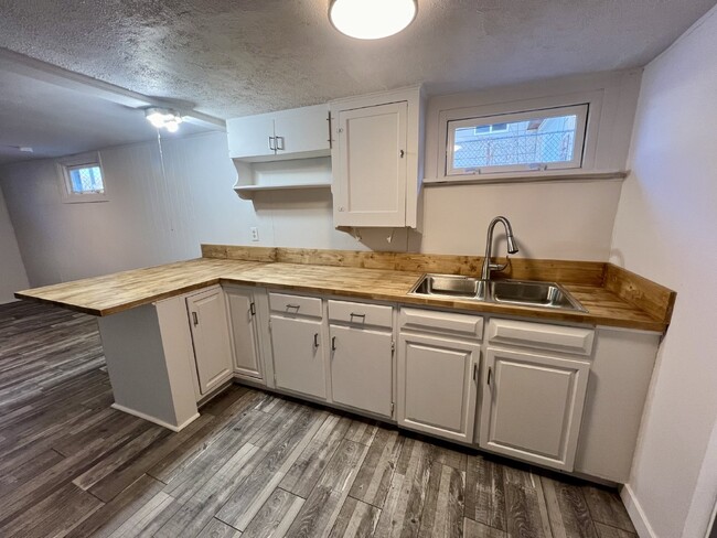 Building Photo - Recently updated basement apartment ready ...