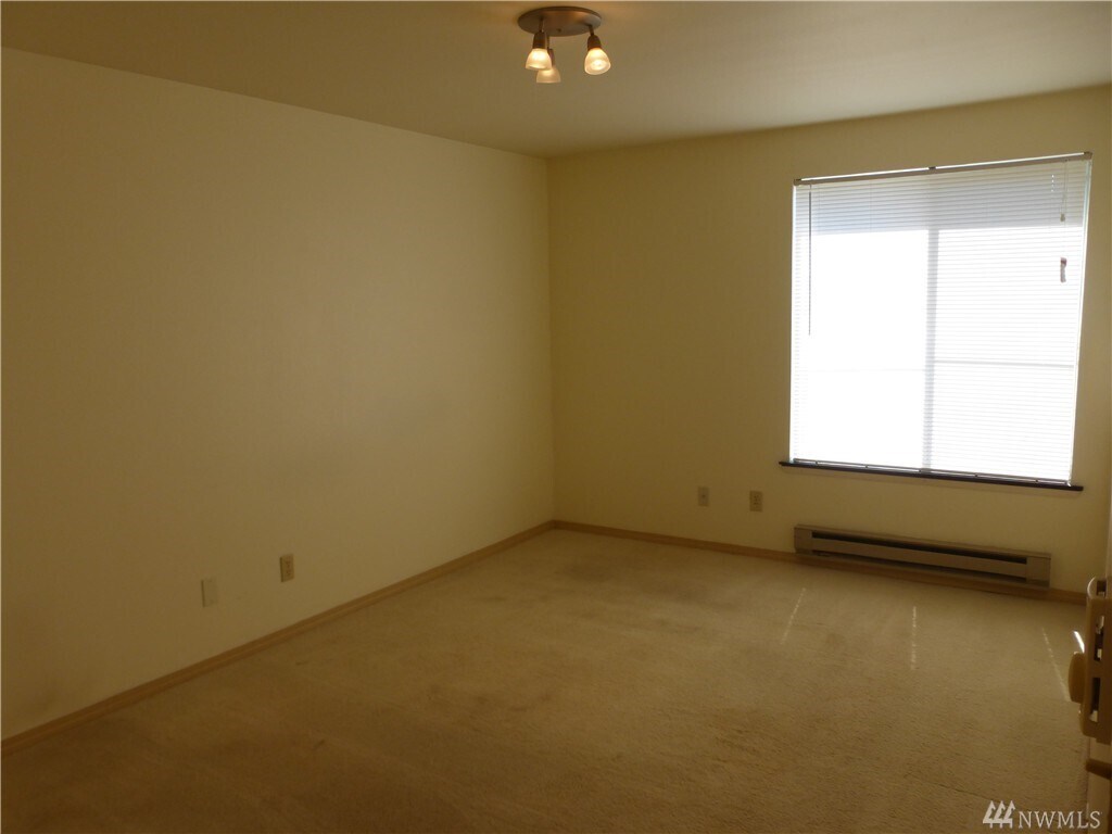 Building Photo - 6970 California Ave SW #B404