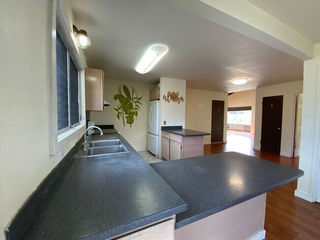 Building Photo - SPACIOUS 4 BEDROOM AHUIMANU SINGLE FAMILY HOME WITH ENCLOSED GARAGE