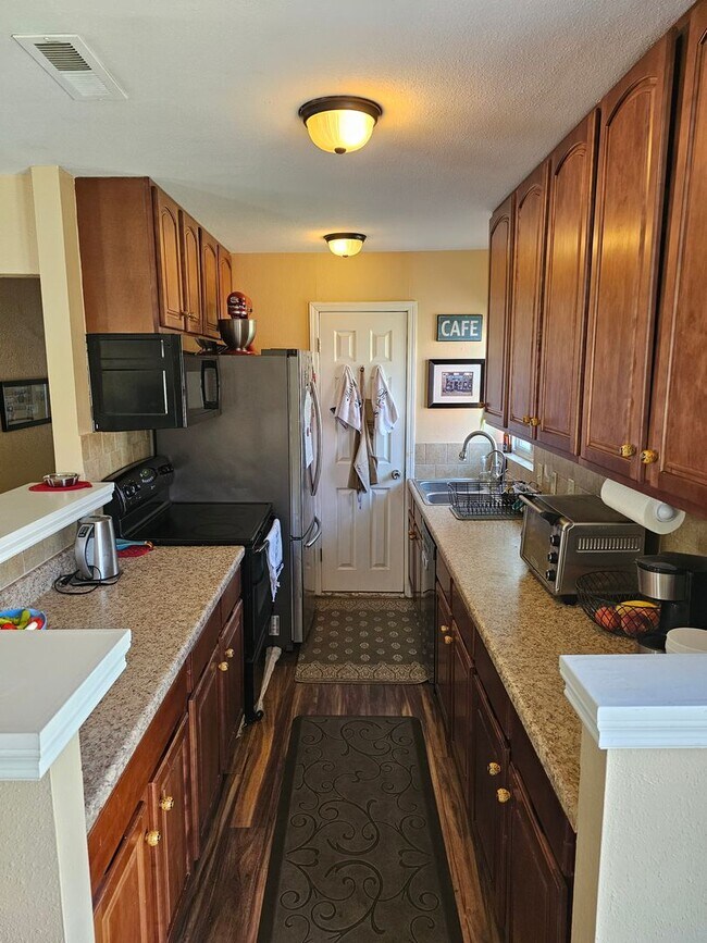Building Photo - University Hills Charming Updated House 3 Bedrooms 1 Bath w/ Large Yard, Solar Panels & More