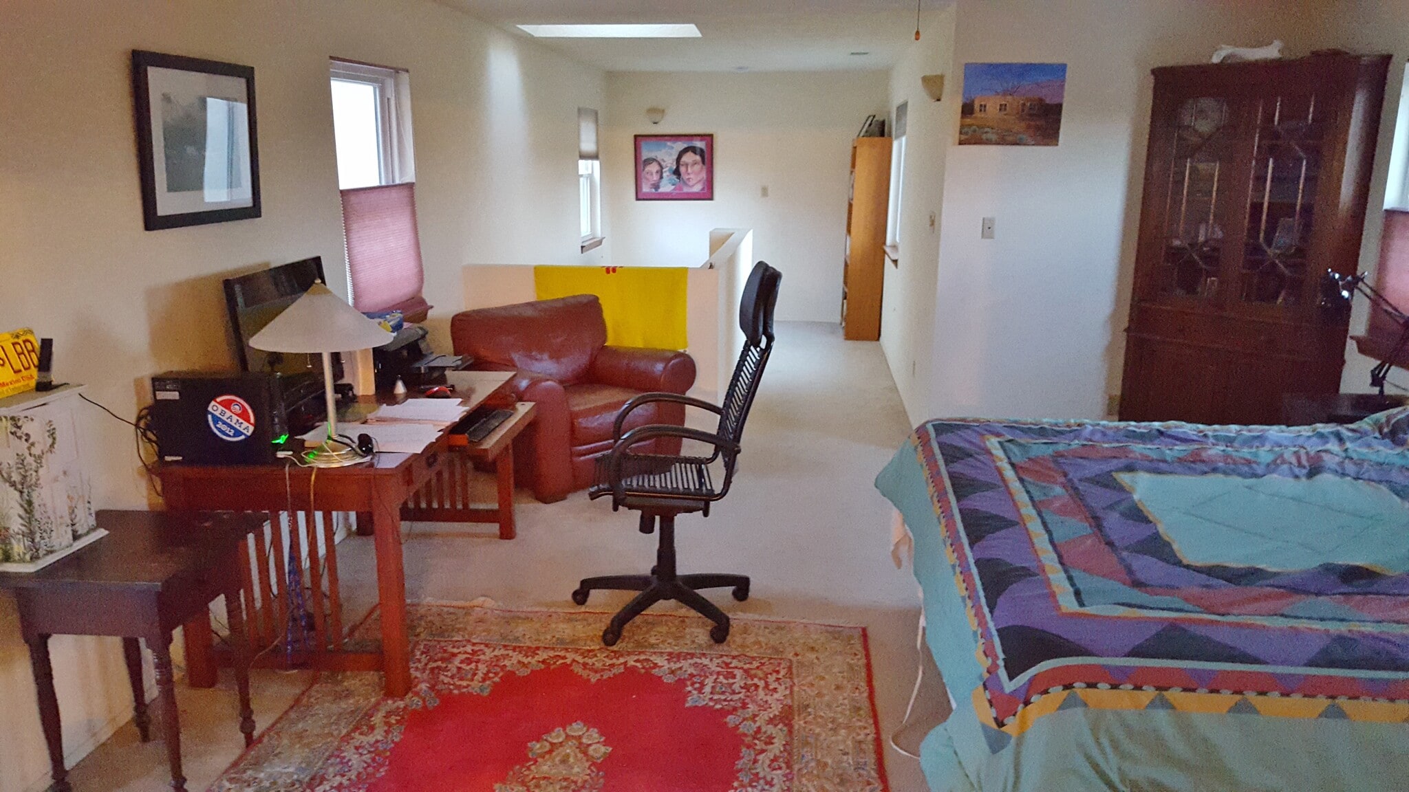 This is the master bedroom looking toward the stairway. - 6436 Saint Josephs Ave NW