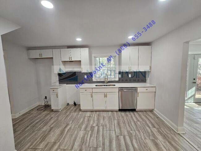 Building Photo - Beautiful 4BR 2BA Home w/ Quartz + SS Kitchen • Fenced Yard • Deck & Porch in SW Atlanta