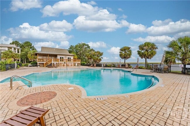 Building Photo - Richmond Hill 3 Bedrooms 2 1/2 Baths with Lagoon View, Screened Porch and Amenities