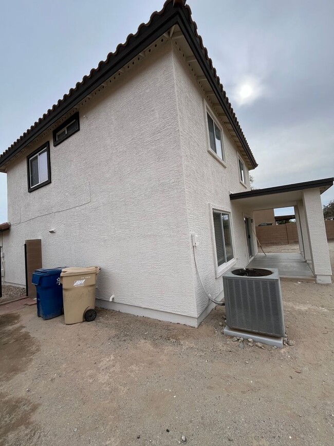 Building Photo - Buckeye, 4 bed, 2.5 bath, huge lot, across...