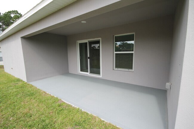 Building Photo - Stunning 4BR/2BA Palm Bay Retreat with Modern Upgrades & Oversized Lot!!