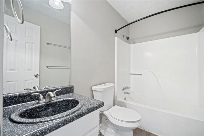 Building Photo - 5590 Princeton Oaks Dr
