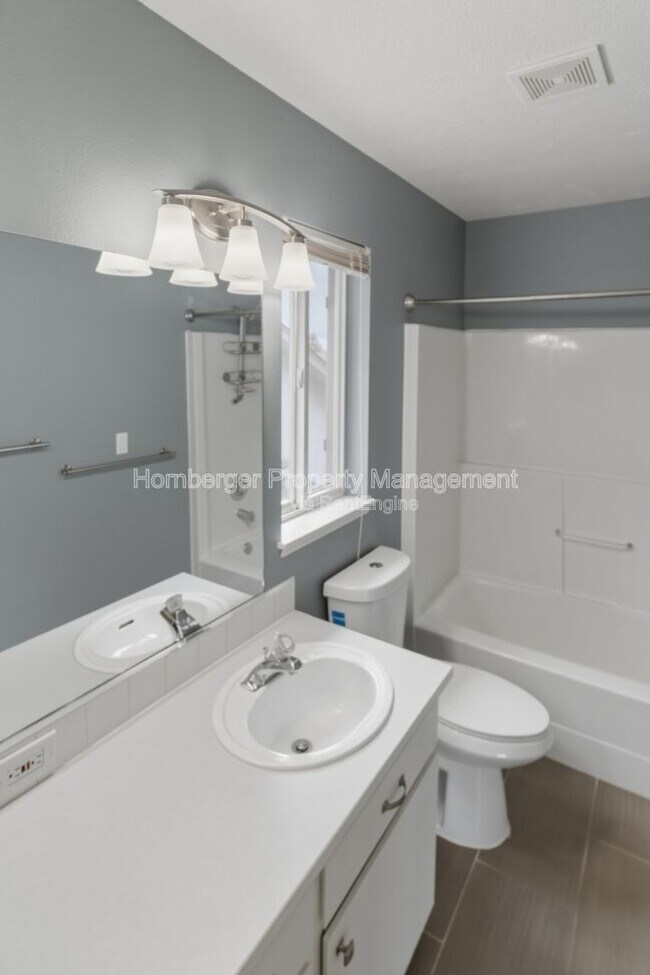 Building Photo - 3628 E 23rd Ave