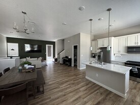 Building Photo - 1566 W 67th Dr