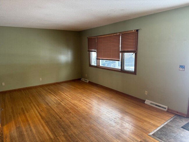 Building Photo - 3 BR / 1 BA Home w/ Fenced Backyard & 2-Car Garage in Spring Lake Park!