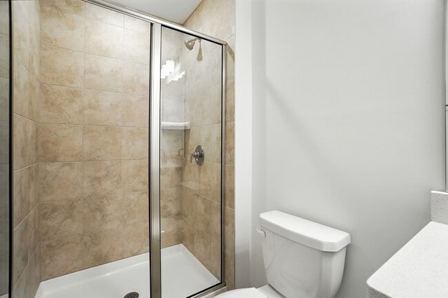 Building Photo - Brand-new three-story townhome in the Univ...