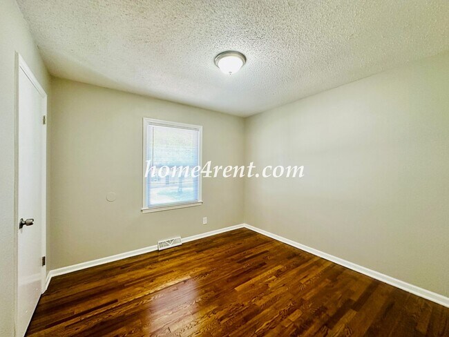 Building Photo - Updated Raytown Ranch w/ Wood Floors, SS Appliances, Finished Basement and a Fenced Yard!