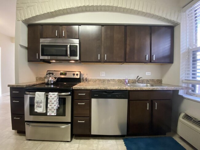 Stainless steel appliances with a built in microwave - 2 Bedroom A - 2849 N Orchard