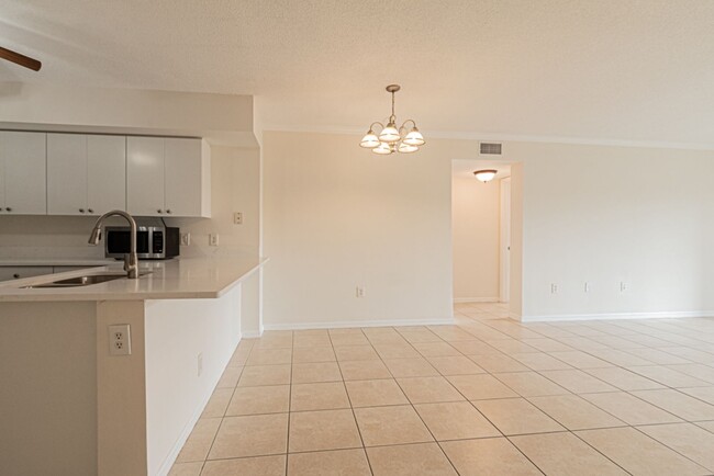 Building Photo - Stylish & Spacious 3BR Condo with Brand-Ne...