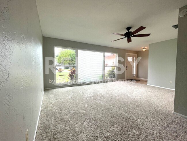 Building Photo - Largo - 4 Bed/2 Bath Single Family Home with Fenced Yard