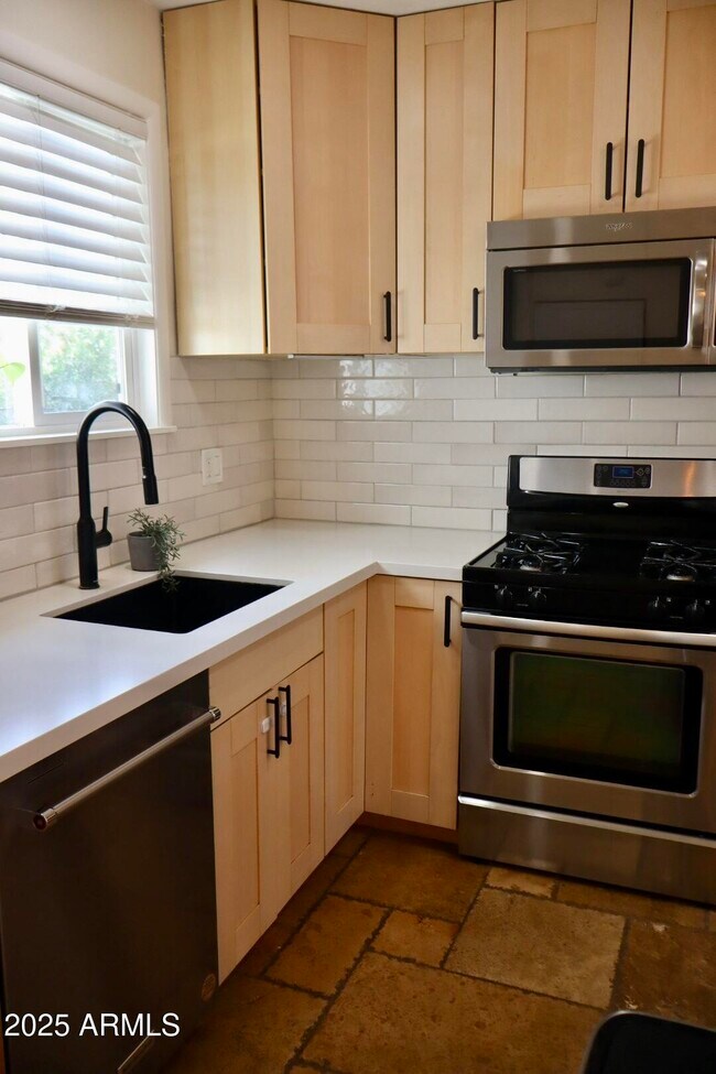 Building Photo - 1107 W Turney Ave