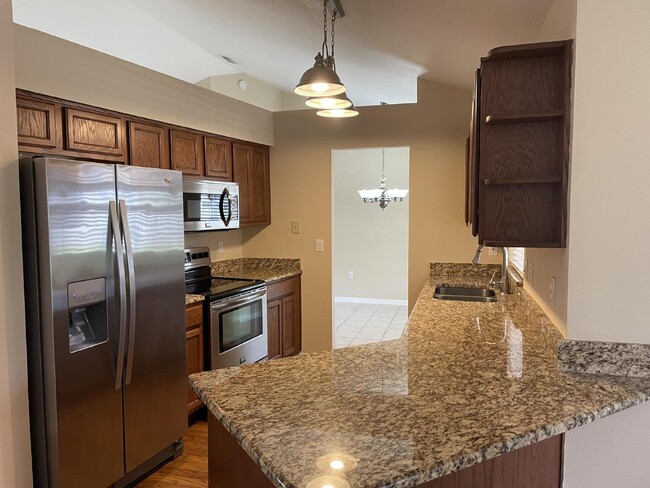 Building Photo - Beautiful 3 Bedroom 2 Bath Pool Home Lawn ...