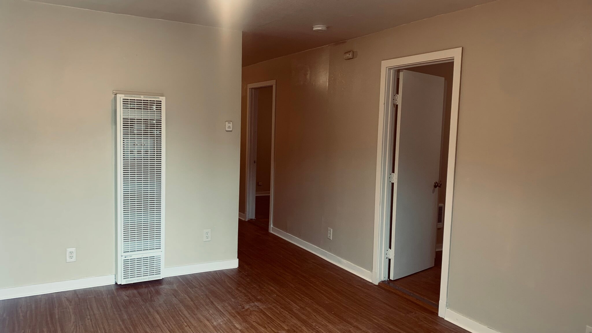 Living room with bedroom doors - 2047 20th Ave