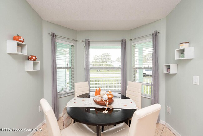 Building Photo - 721 Taluga Ave SE