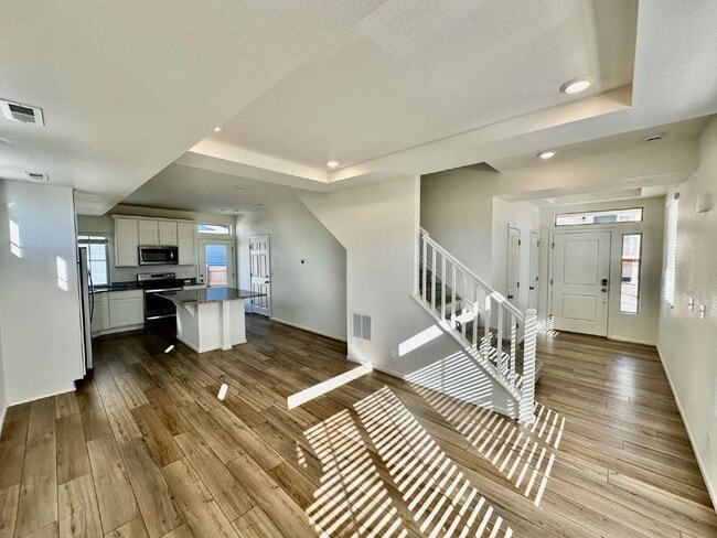 Building Photo - "Charming and spacious 3-Bed Sanctuary with 2.5 Baths the Reunion Community in Commerce City!"