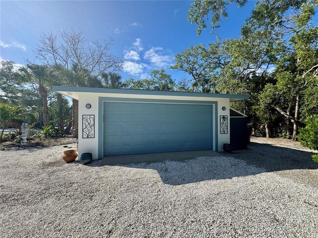 Building Photo - 7372 Melaleuca Way