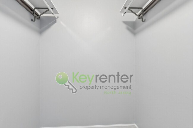 Building Photo - Spacious 2BR/2BA Duplex in Gated Community with Parking, Washer/Dryer & NYC Skyline Views