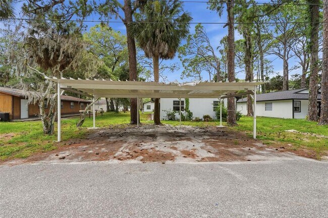 Building Photo - 7133 Pinewood Dr