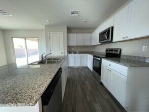 Building Photo - 4 bed 2 bath spacious home with garage BHCRENT.COM