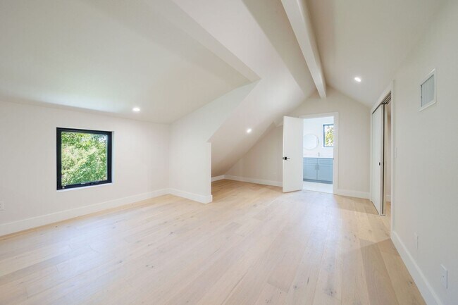Building Photo - Luxury Redefined: Experience Vibrant Living in this 3-Bedroom Haven in East Austin
