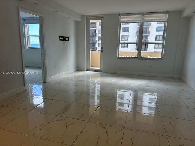 Building Photo - 10185 Collins Ave