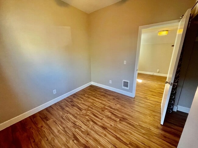 Building Photo - Prime Location! Modern 2BD/1 BA with A/C & EV Charging Steps from Mississippi