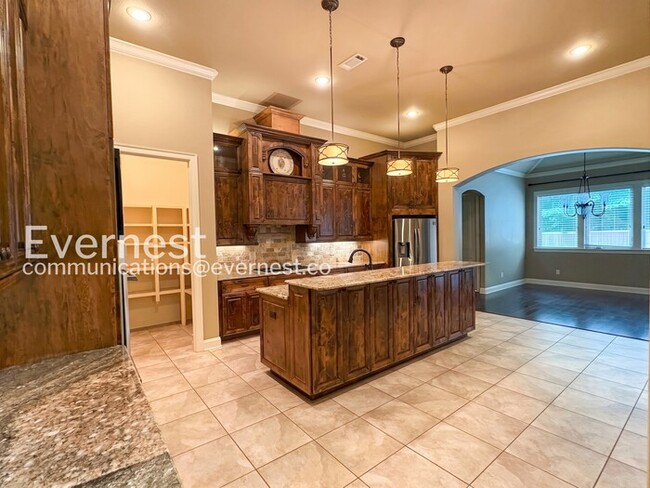 Building Photo - Welcome to this elegant 4-bedroom, 5-bathroom home in desirable Hurricane Lake Estates with Pool ...