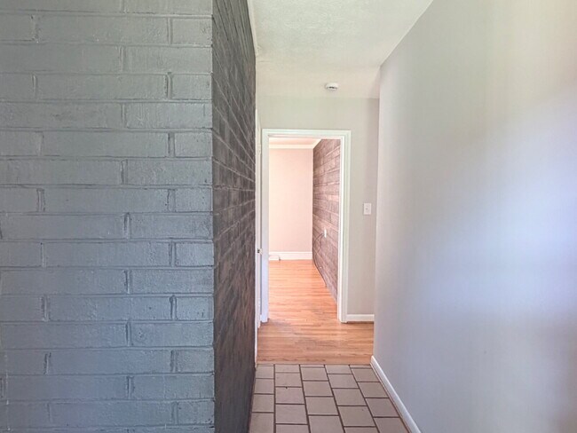 Building Photo - Updated 3BR Home in Beaver Lake | Fenced Yard, Garage, Covered Porch & Outdoor Fireplace | Pet Fr...
