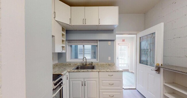 Building Photo - Extraordinary Columbia Heights Opportunity | Spacious 5BR + 2 Den Home with Off-Street Parking