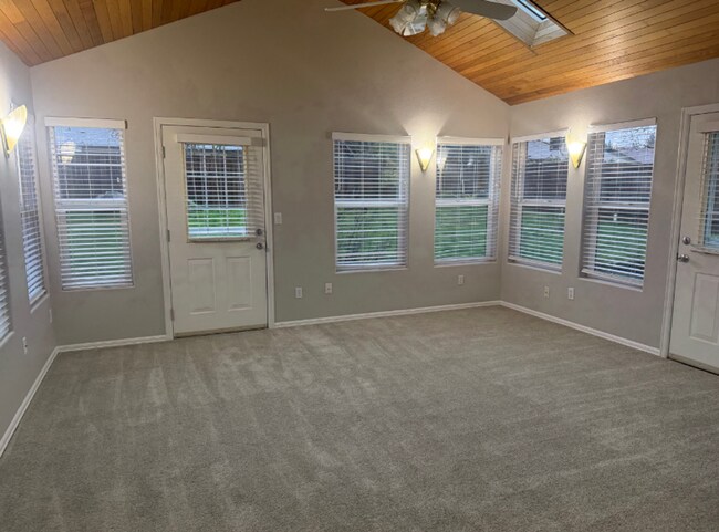 Building Photo - Charming 3 Bedroom with a Living Room, Sun Room,Huge Fenced Yard & More!